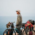 ទីវ តារារិទ្ធ ផ្តាំតាមខ្យល់មហាសមុទ្រ​ថា​ នឹករលឹកស្រណោះខ្មែរ ខណៈកំពុងជិះកង់ឆ្លងទ្វីប ដើម្បីកុមារកម្ពុជា!